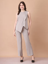 Exude Unbreakable Soft Matt Satin Overlay Sleeveless Top Paired With Straight Fit Trousers Light Beige Co-ord Sets