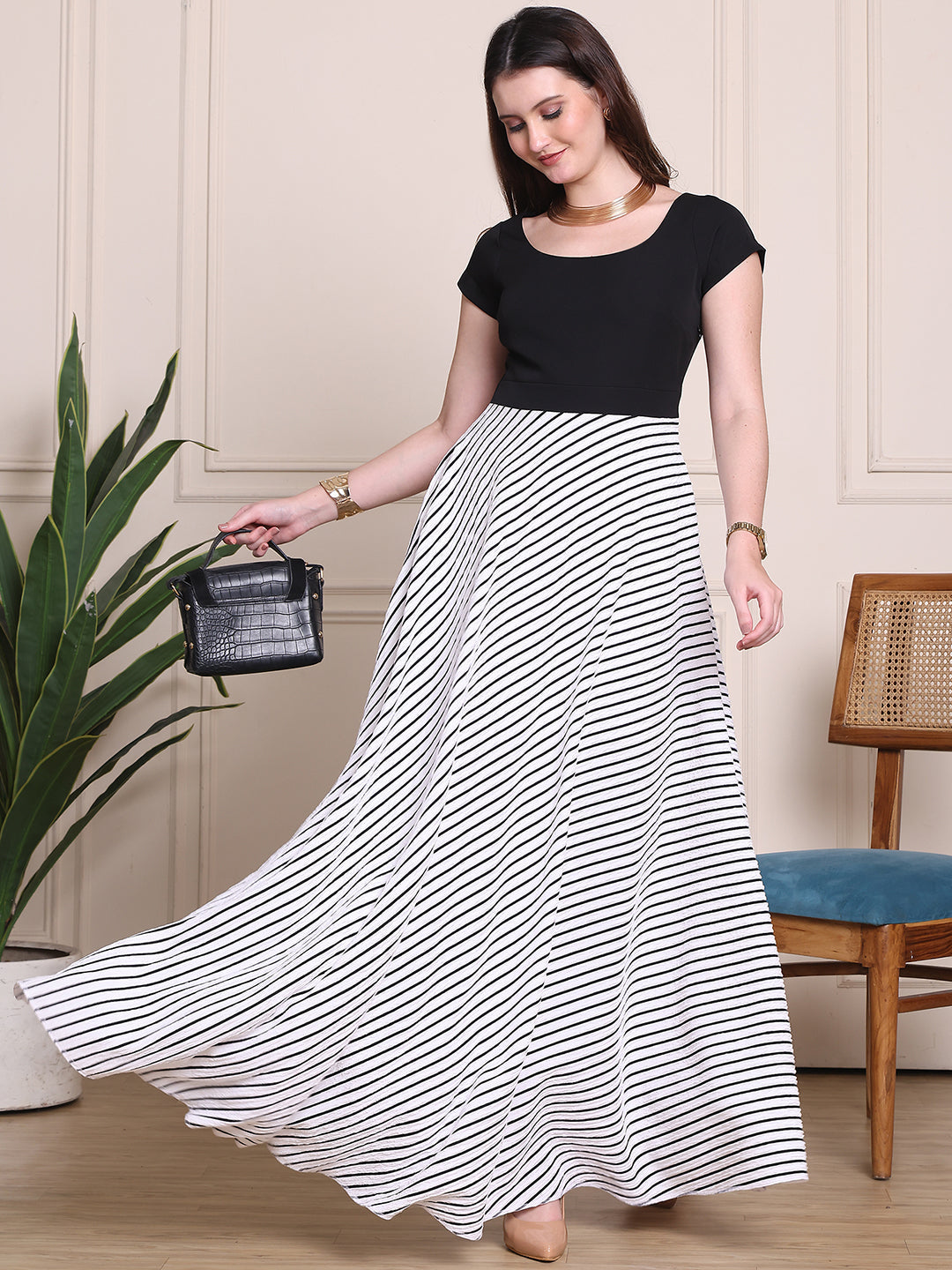 Exude Glamour Reign Dramatic Black And White Gown With Cap Sleeve