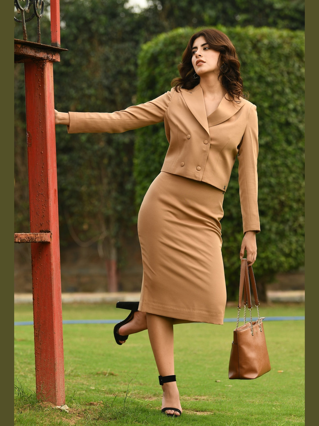 Exude Marvelous Pencil Midi Skirt Beige Skirts